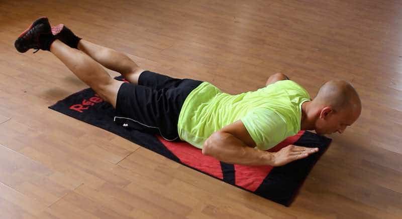 Extension lombaires au sol : un exercice efficace pour muscler le bas ...